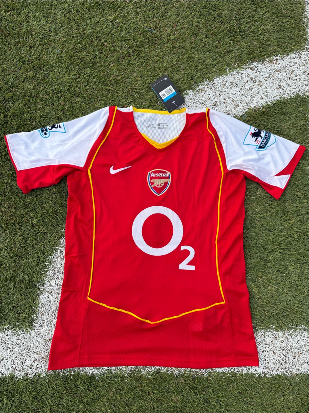 Nike Red Arsenal Short-Sleeve Jersey with White Sleeves and Yellow Trim